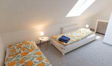 3. Schlafzimmer mit 2 Einzelbetten im Obergeschoss