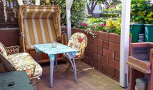 Terrasse mit Grill und Sitzecke