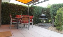 überdachte Terrasse mit Grillplatz