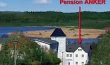 Blick vom Zinglingsberg auf Pension ANKER; im Hintergund der Schmachter See